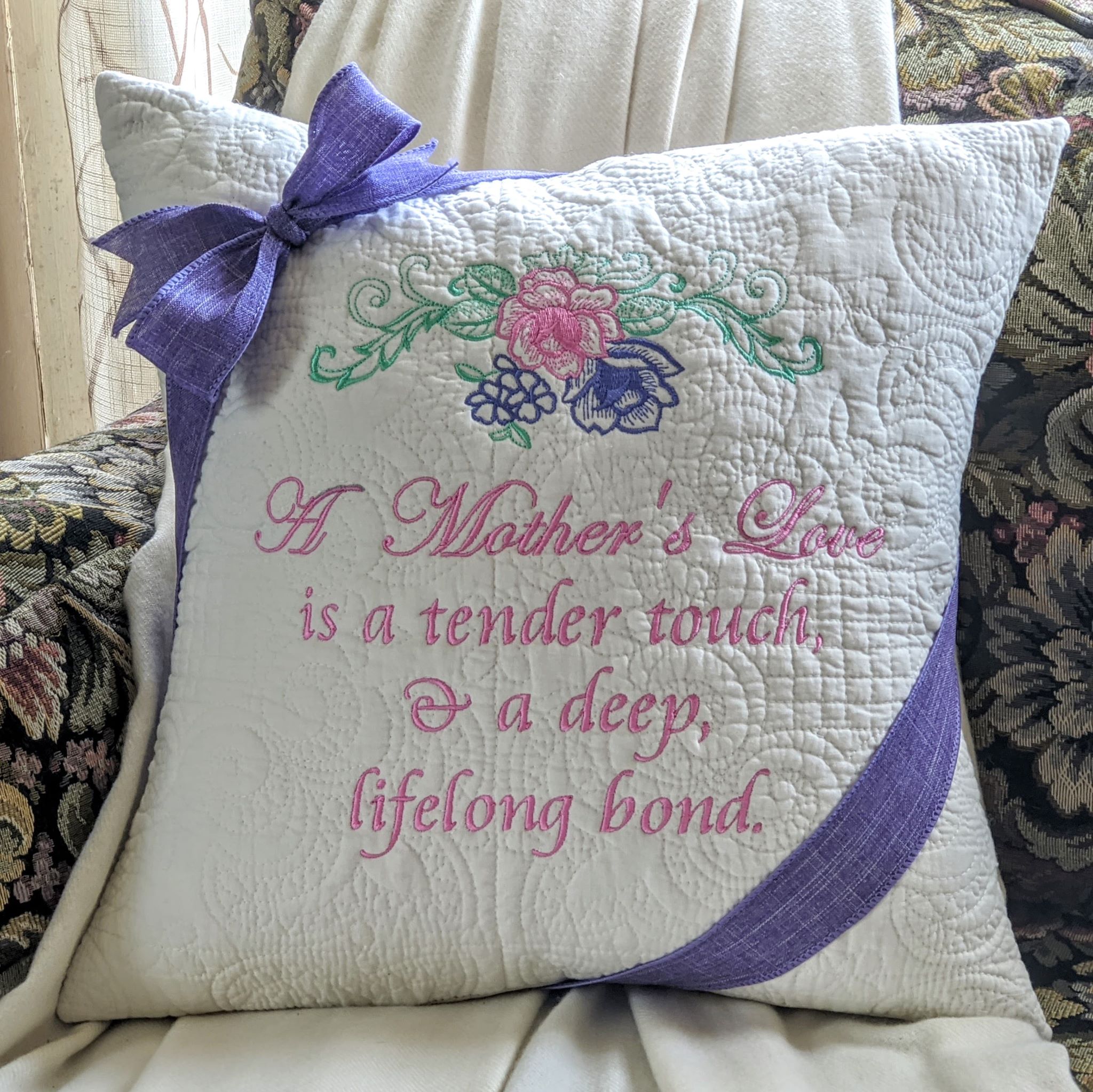 Embroidered throws and pillows family